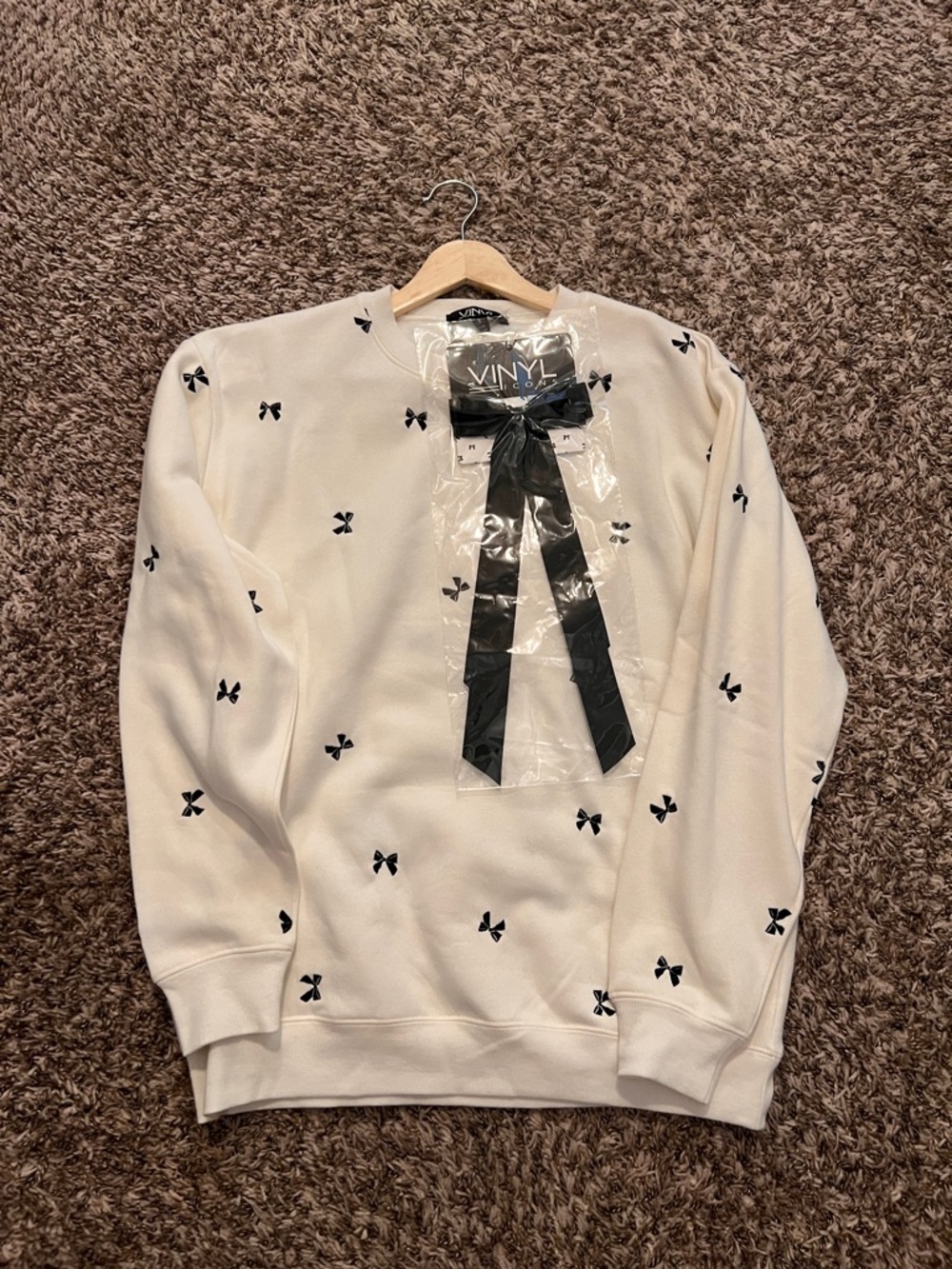 VINYL Signature Cream Crewneck Sweatshirt with Black Bow Accents